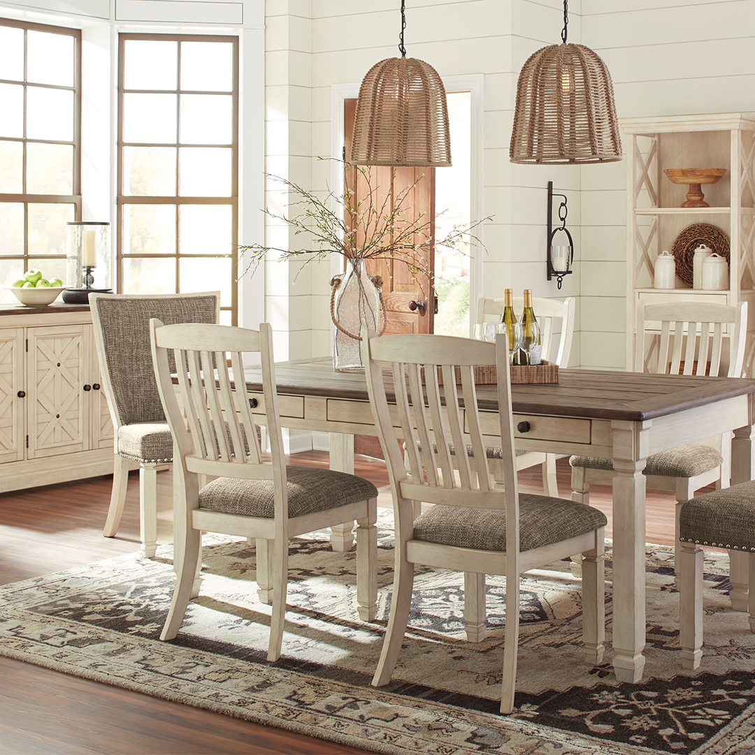 Sun filled room with wood table and six chairs