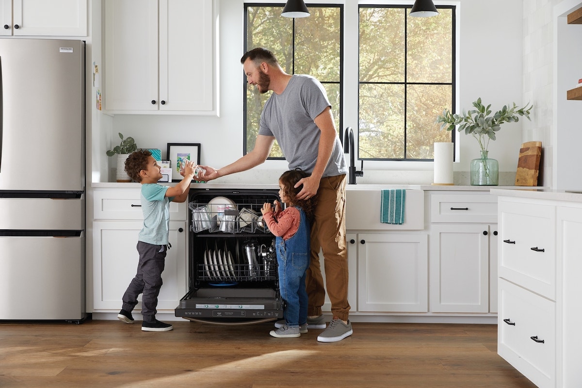 father and children in kitchen